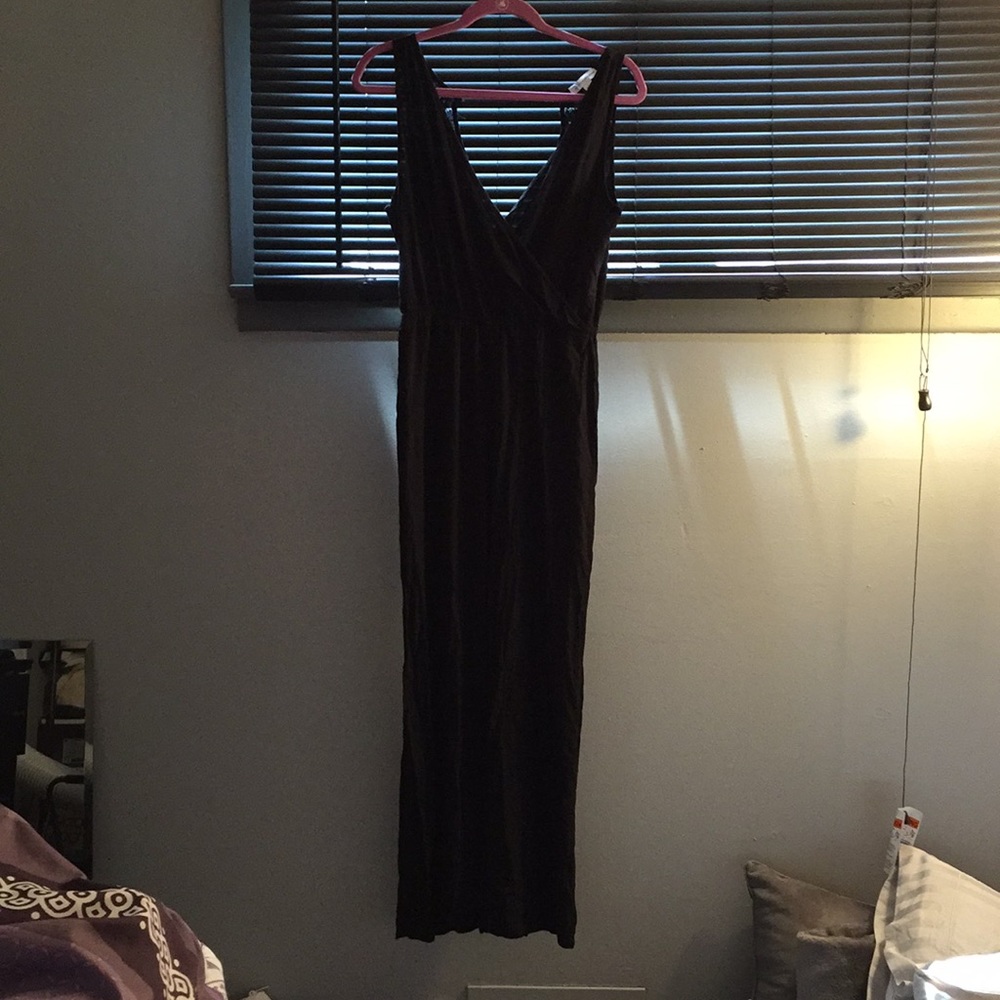 Black jumpsuit, lace back.